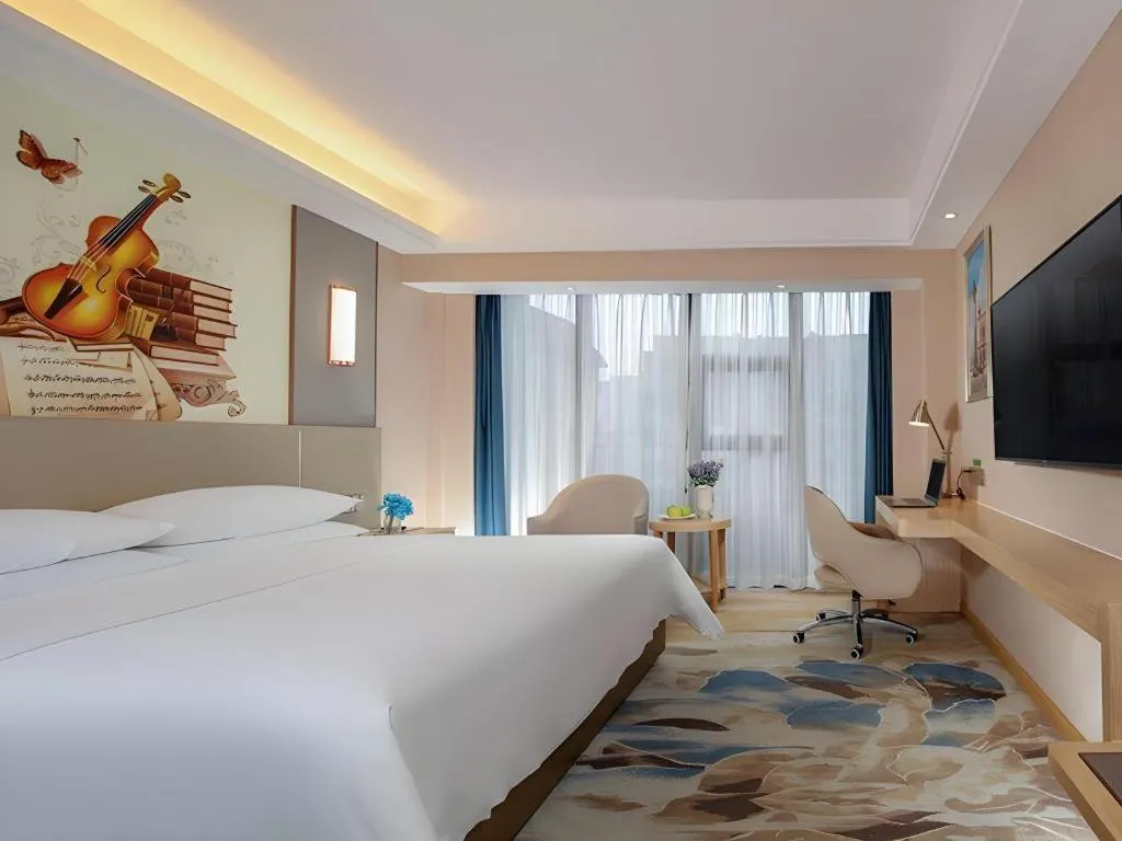 Bed in Vienna Hotel Chengdu Xinjin Old Pier Liujianian Metro Station