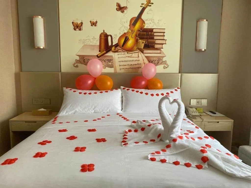 Bed in Vienna Hotel Chengdu Xinjin Old Pier Liujianian Metro Station