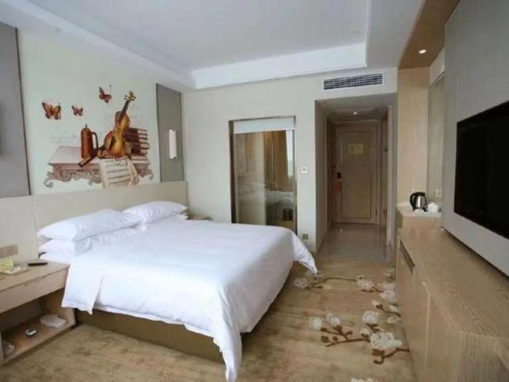 Bed in Vienna Hotel Chengdu Xinjin Old Pier Liujianian Metro Station