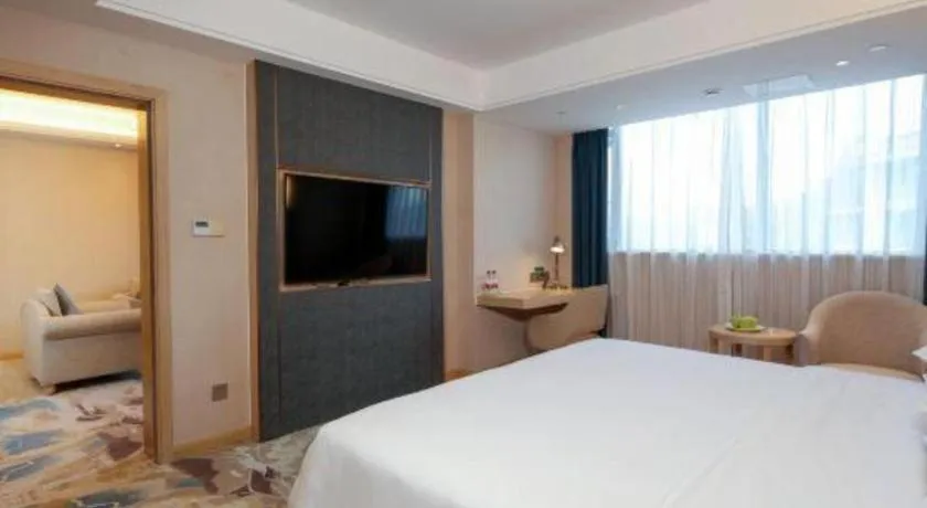 Bed in Vienna Hotel Chengdu Xinjin Old Pier Liujianian Metro Station