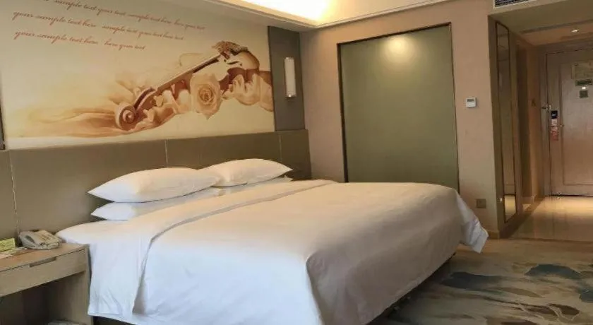 Bed in Vienna Hotel Chengdu Xinjin Old Pier Liujianian Metro Station