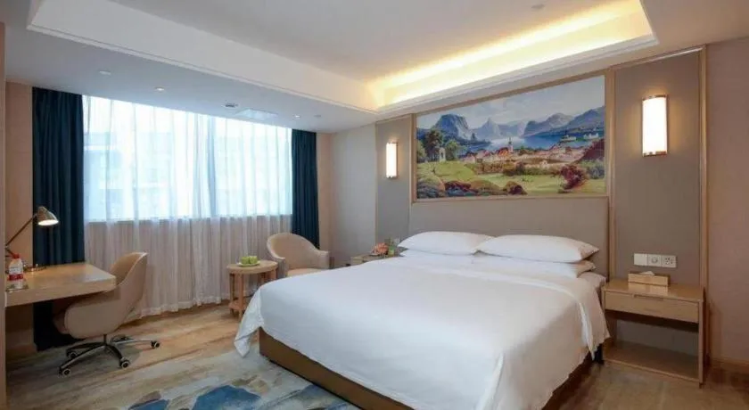 Bed in Vienna Hotel Chengdu Xinjin Old Pier Liujianian Metro Station