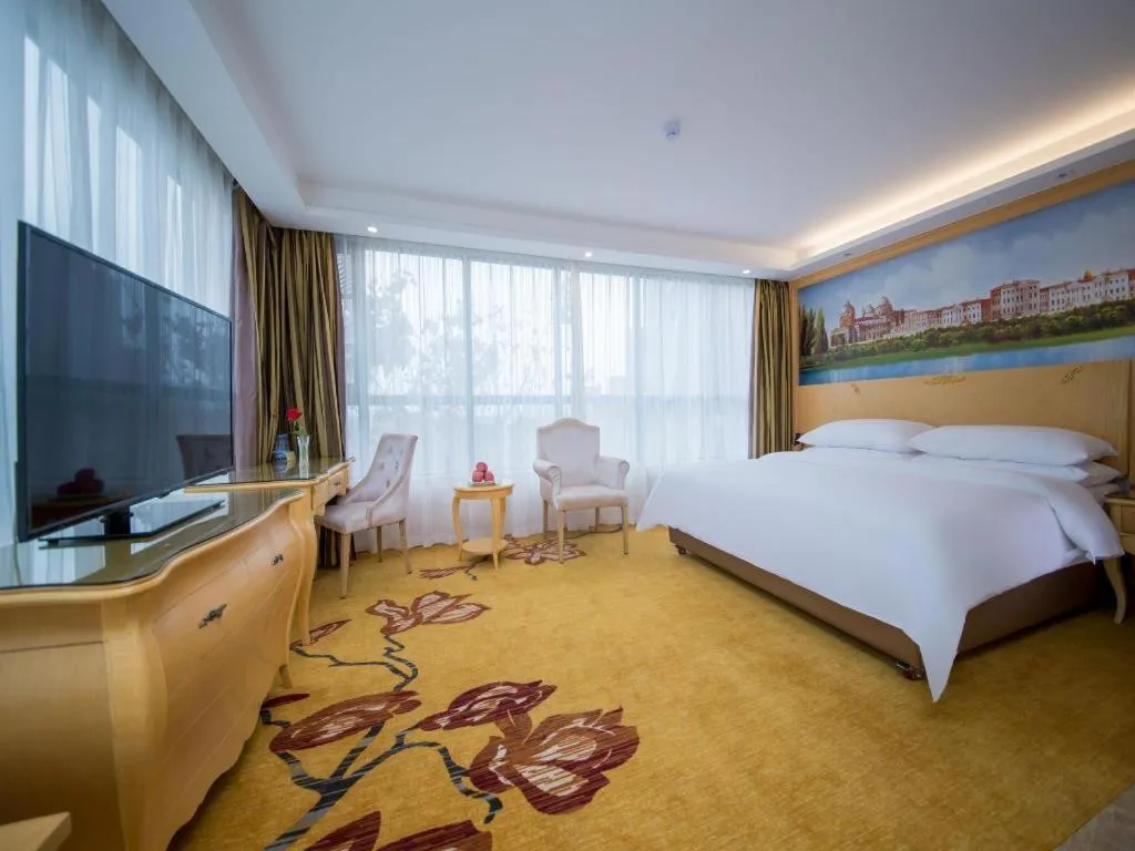 Bed in Vienna Hotel Wuhan Huazhong Normal University Huquan Metro Station