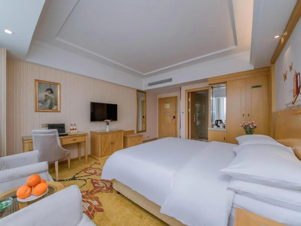 Bed in Vienna Hotel Wuhan Huazhong Normal University Huquan Metro Station