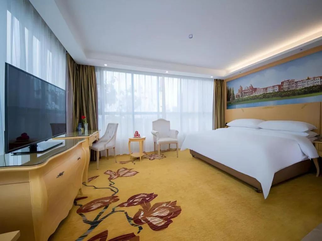 Bed in Vienna Hotel Wuhan Huazhong Normal University Huquan Metro Station