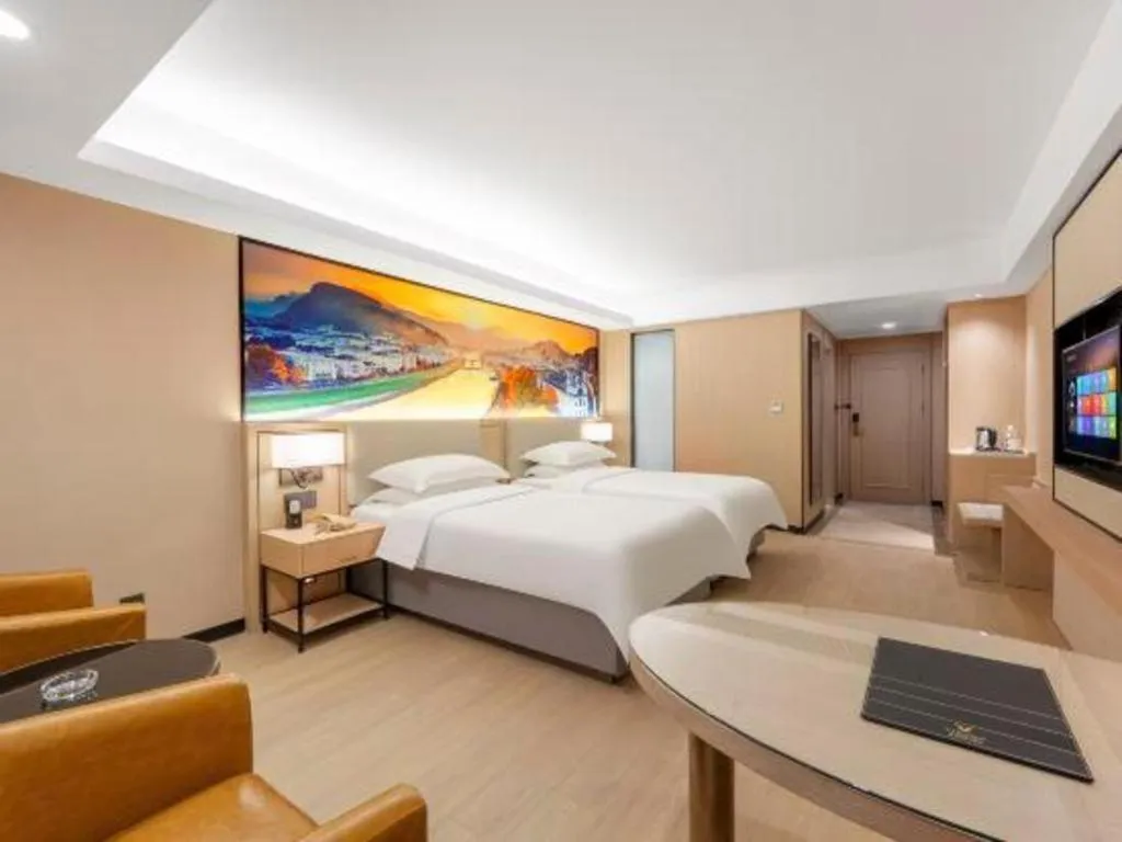Bed in Vienna Hotel Shandong Jinan High-Tech Wanda Exhibition Center