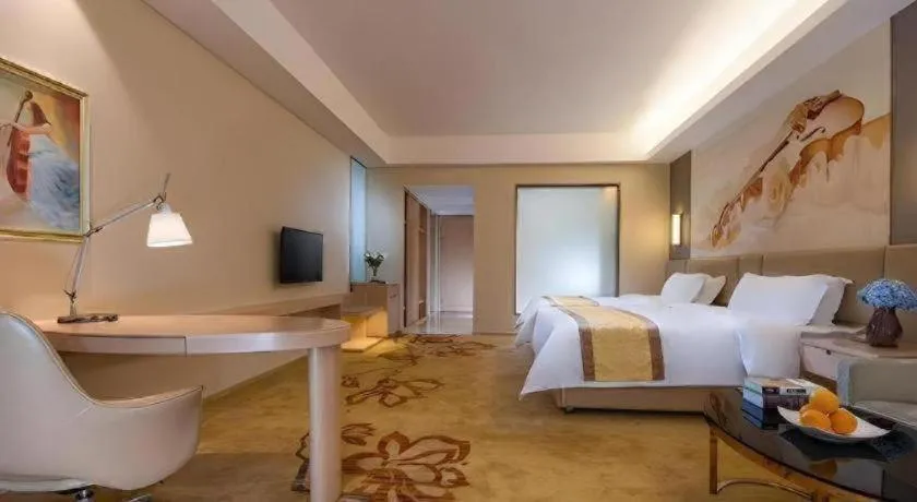 Bed in Vienna Hotel Shandong Jinan High-Tech Wanda Exhibition Center