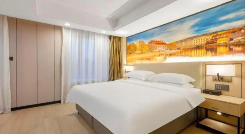 Bed in Vienna Hotel Shandong Jinan High-Tech Wanda Exhibition Center