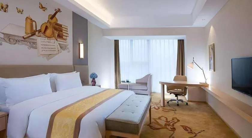 Bed in Vienna Hotel Shandong Jinan High-Tech Wanda Exhibition Center