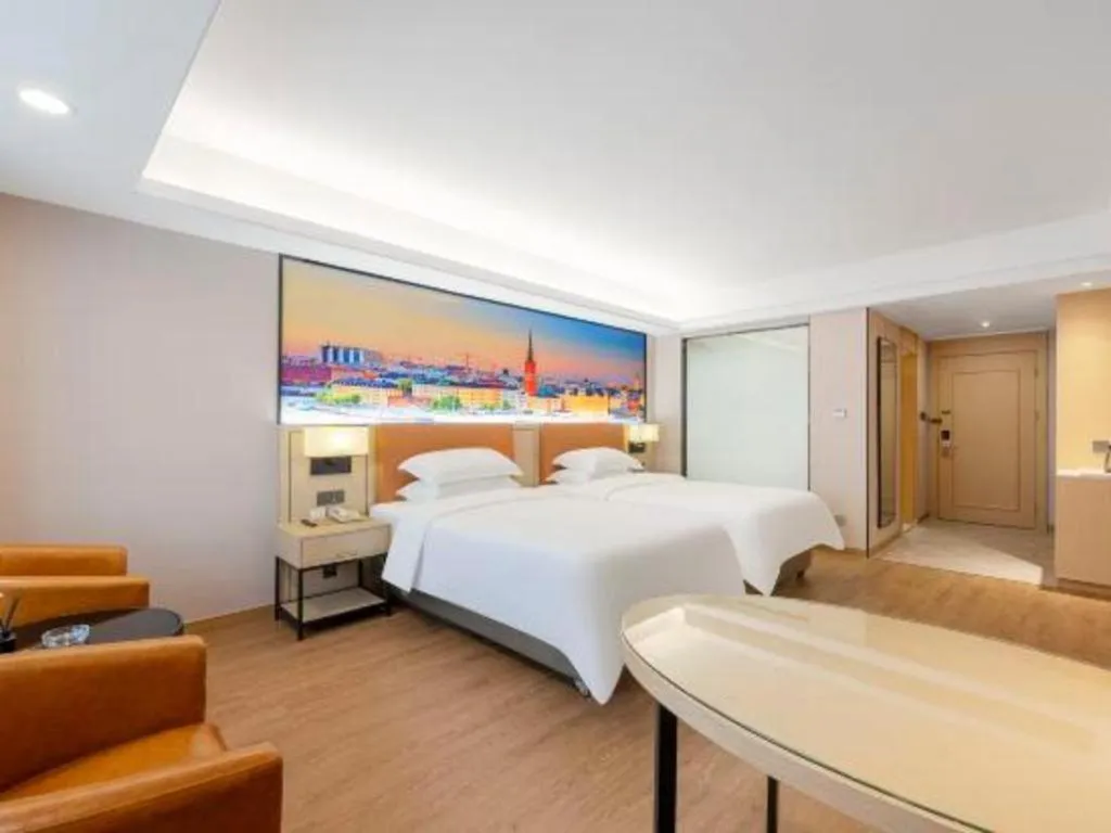 Bed in Vienna Hotel Shandong Jinan High-Tech Wanda Exhibition Center