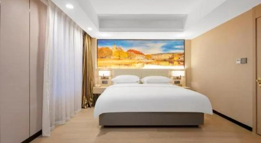 Bed in Vienna Hotel Shandong Jinan High-Tech Wanda Exhibition Center