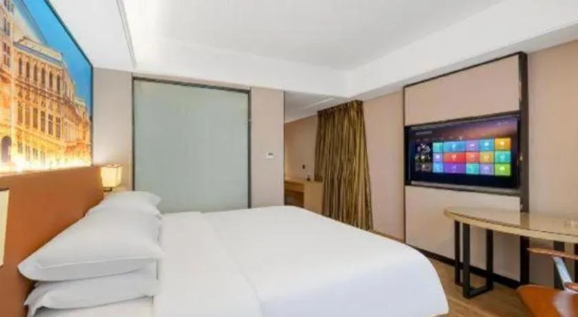 Bed in Vienna Hotel Shandong Jinan High-Tech Wanda Exhibition Center