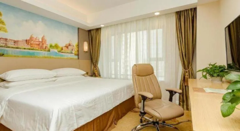 Bed in Vienna Hotel Shandong Jinan High-Tech Wanda Exhibition Center
