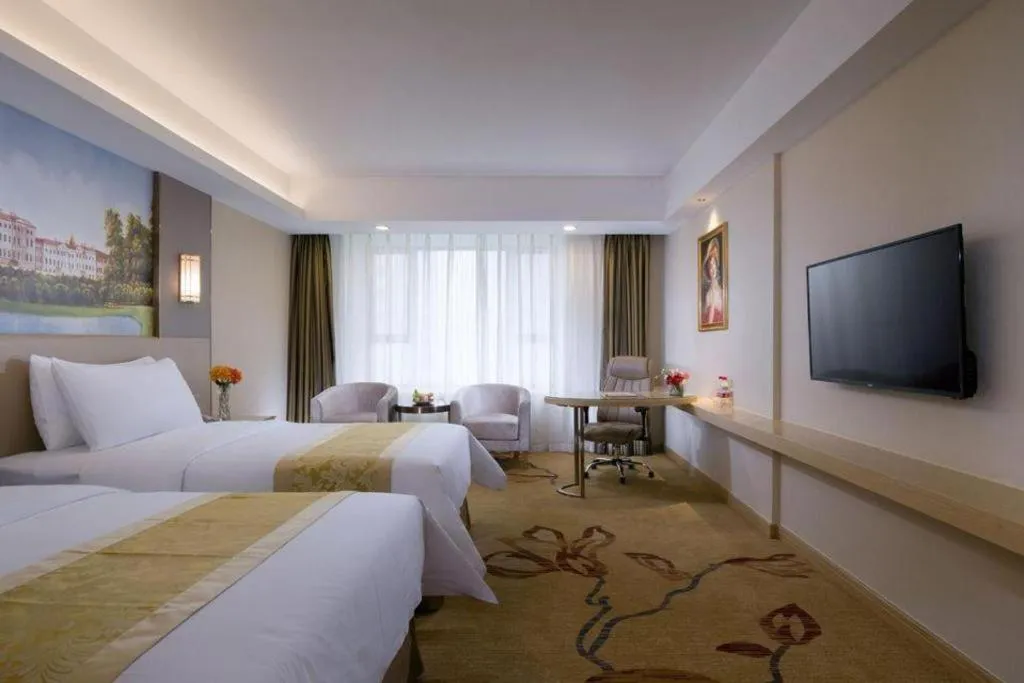 Bed in Vienna Hotel Shandong Jinan High-Tech Wanda Exhibition Center