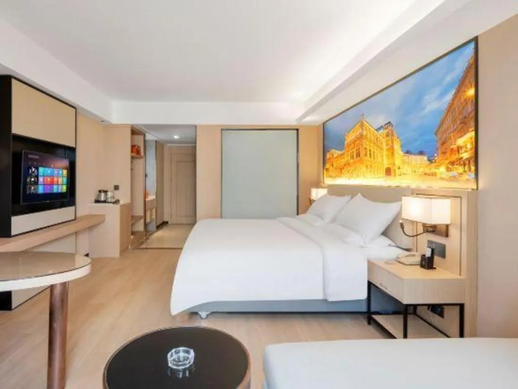 Bed in Vienna Hotel Shandong Jinan High-Tech Wanda Exhibition Center