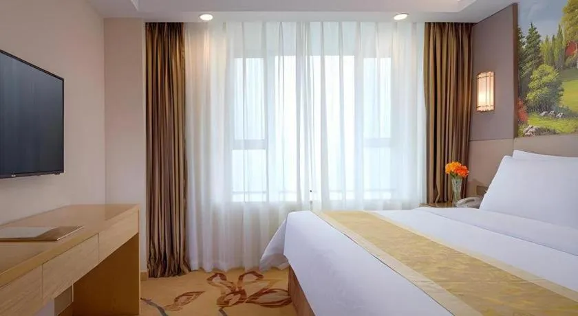 Bed in Vienna Hotel Shandong Jinan High-Tech Wanda Exhibition Center