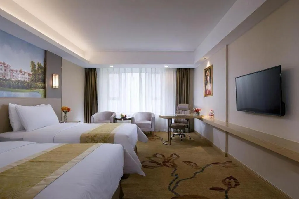 Bed in Vienna Hotel Shandong Jinan High-Tech Wanda Exhibition Center