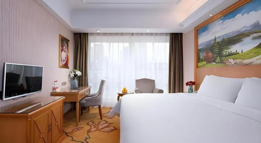 Bed in Vienna Hotel Zhejiang Ningbo Beilun In Time City
