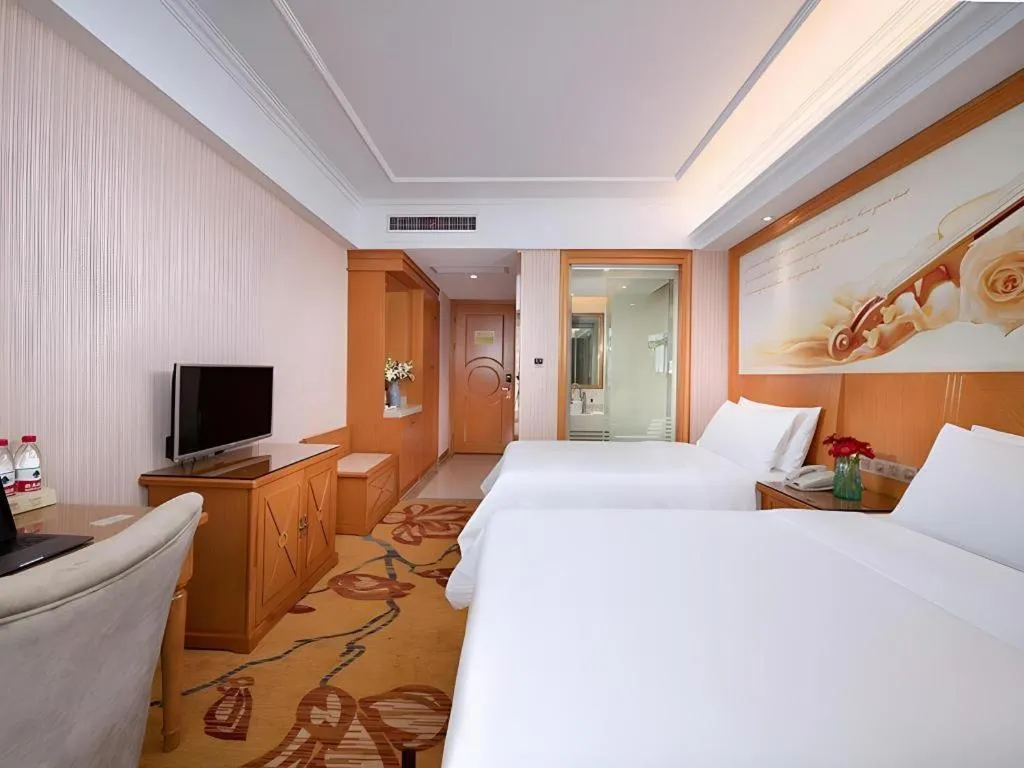Bed in Vienna Hotel Zhejiang Ningbo Beilun In Time City