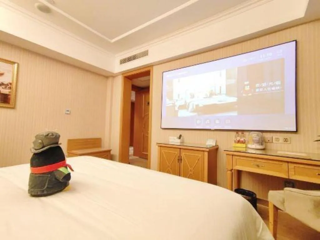 Bed in Vienna Hotel Zhejiang Ningbo Beilun In Time City
