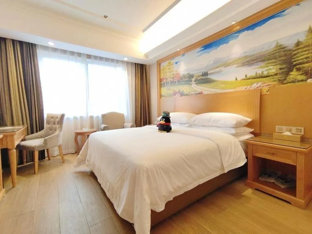 Bed in Vienna Hotel Zhejiang Ningbo Beilun In Time City