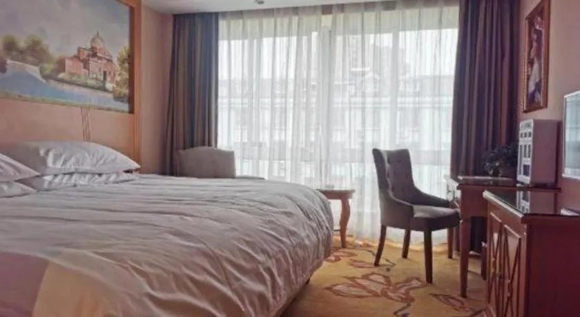 Bed in Vienna Hotel Zhejiang Ningbo Beilun In Time City