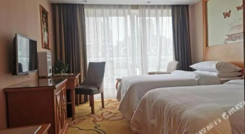Bed in Vienna Hotel Zhejiang Ningbo Beilun In Time City