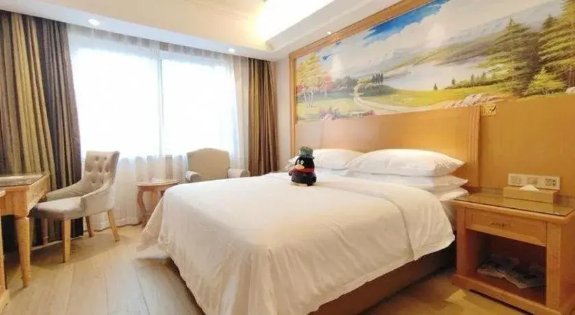 Bed in Vienna Hotel Zhejiang Ningbo Beilun In Time City Bed in Vienna Hotel Zhejiang Ningbo Beilun In Time City