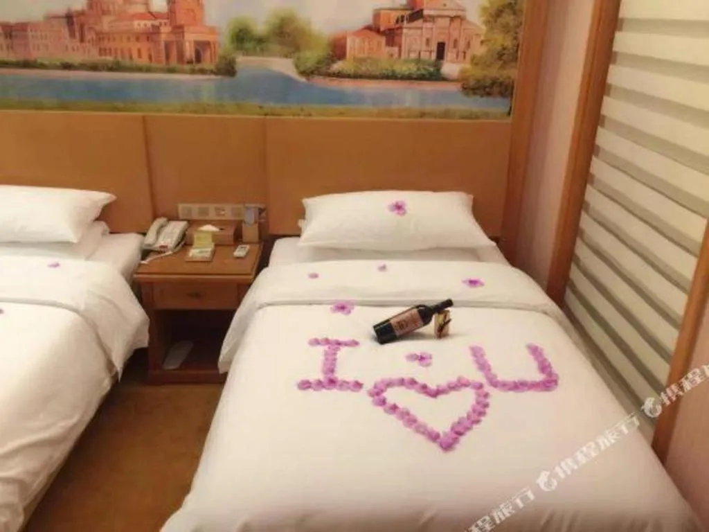 Bed in Vienna Hotel Zhejiang Ningbo Beilun In Time City