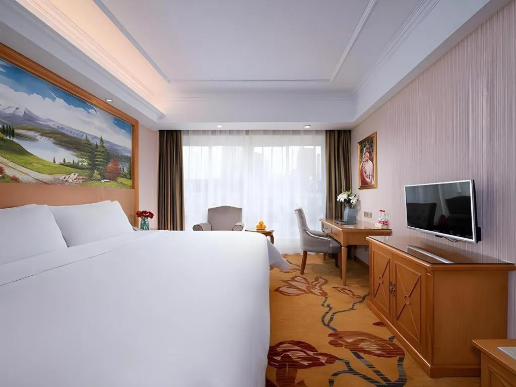 Bed in Vienna Hotel Zhejiang Ningbo Beilun In Time City