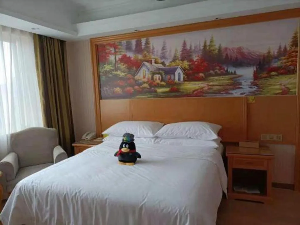 Bed in Vienna Hotel Zhejiang Ningbo Beilun In Time City