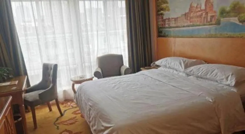 Bed in Vienna Hotel Zhejiang Ningbo Beilun In Time City