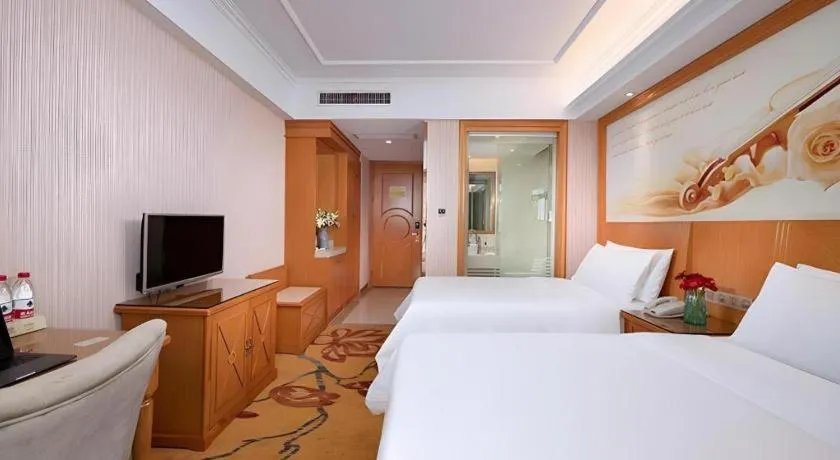 Bed in Vienna Hotel Zhejiang Ningbo Beilun In Time City