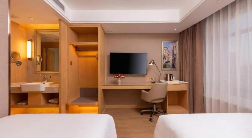 Bed in Vienna Hotel Tianjin Olympic Sports Center Tianta