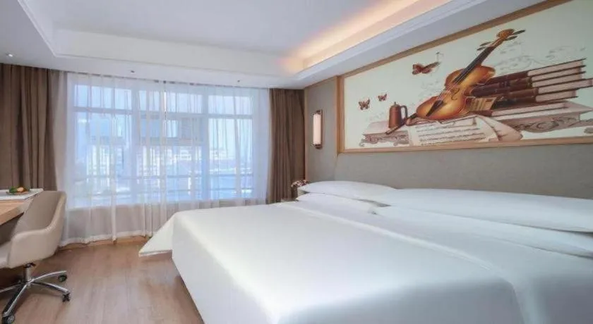 Bed in Vienna Hotel Tianjin Olympic Sports Center Tianta
