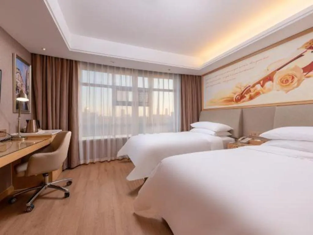 Bed in Vienna Hotel Tianjin Olympic Sports Center Tianta