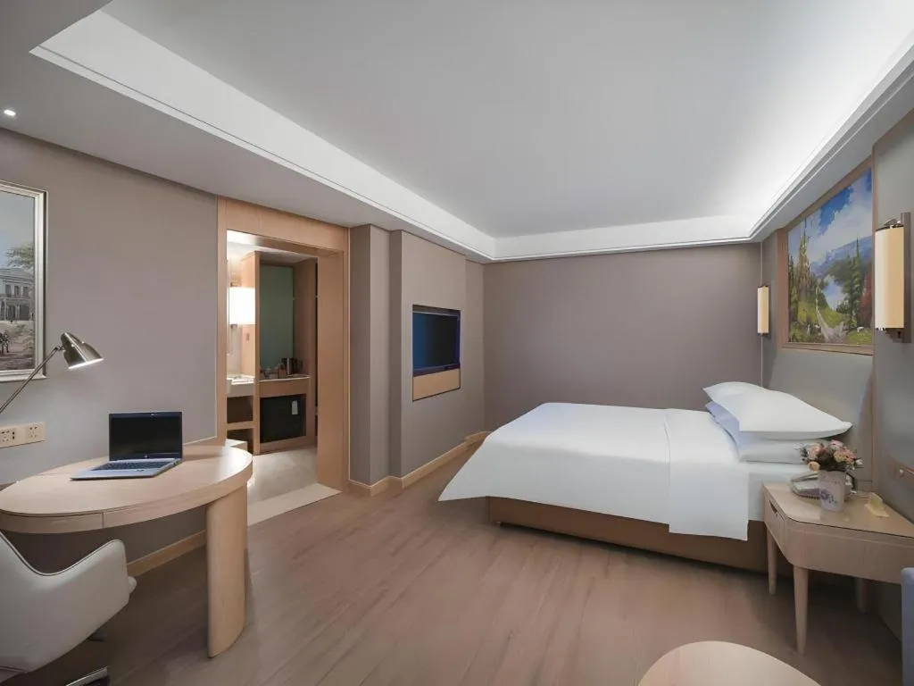 Bed in Vienna Hotel Tianjin Olympic Sports Center Tianta