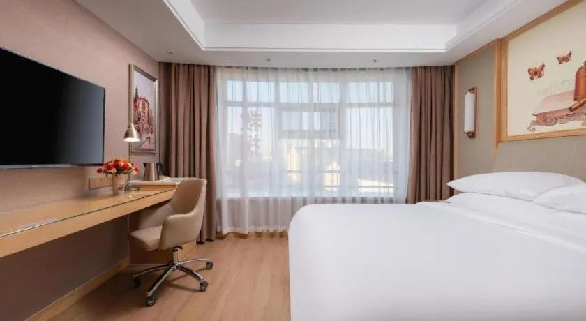 Bed in Vienna Hotel Tianjin Olympic Sports Center Tianta