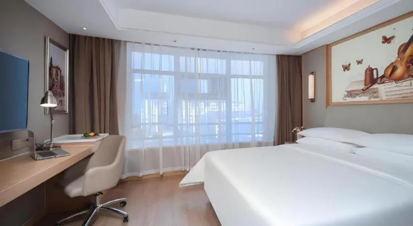 Bed in Vienna Hotel Tianjin Olympic Sports Center Tianta