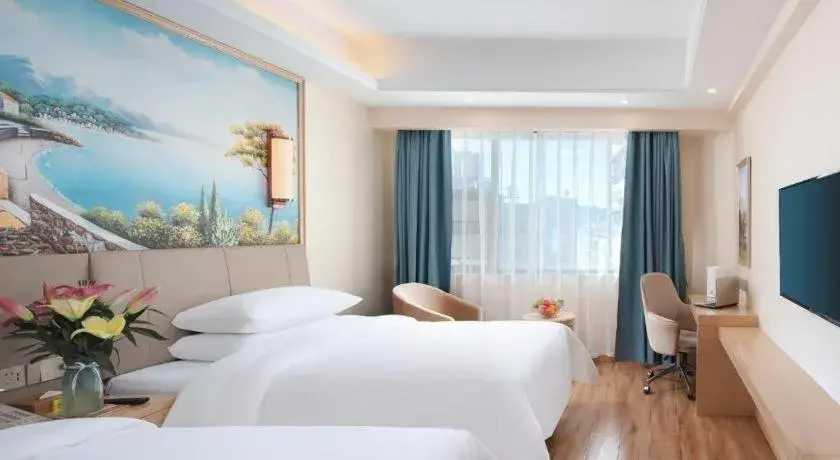 Bed in Vienna Hotel Kunming Baiyun Road Metro Station Jiang'an Bed in Vienna Hotel Kunming Baiyun Road Metro Station Jiang'an