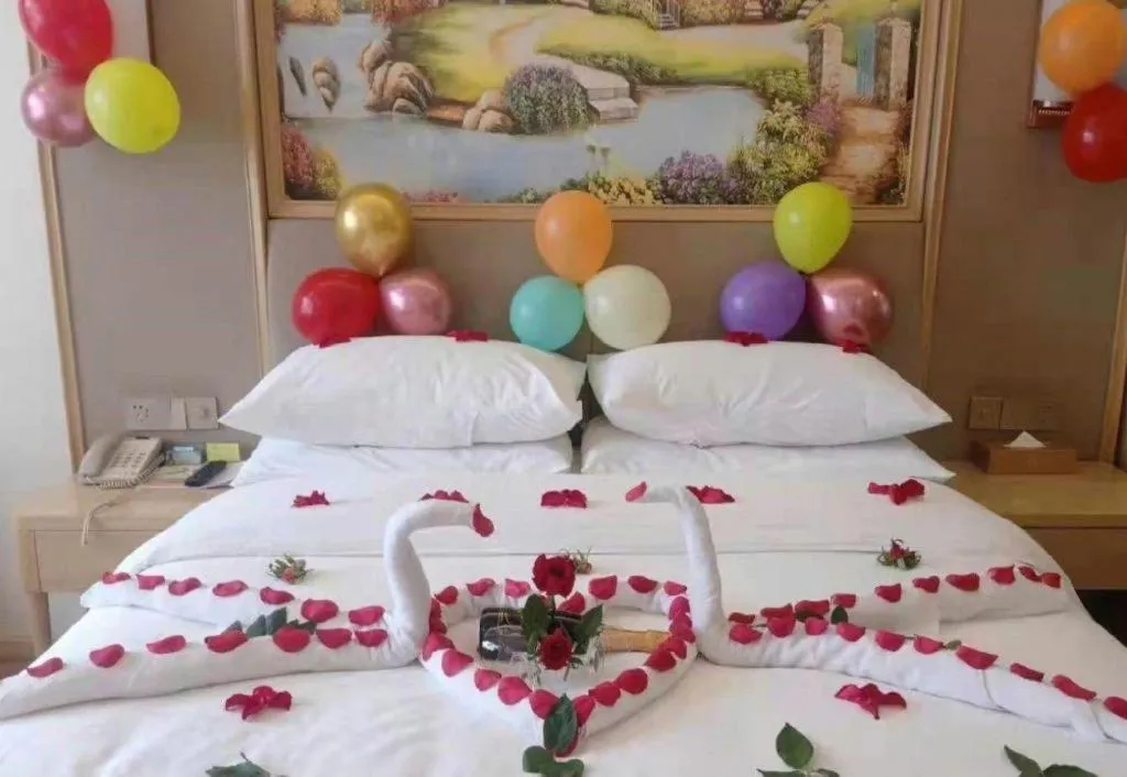 Bed in Vienna Hotel Kunming Baiyun Road Metro Station Jiang'an