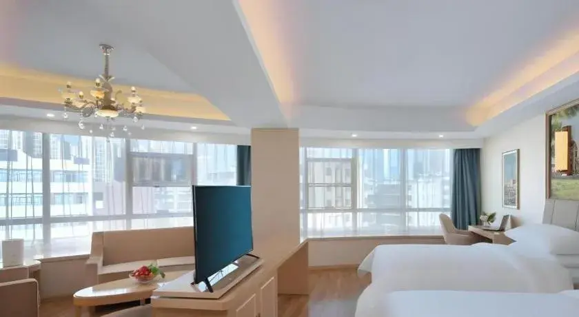 Bed in Vienna Hotel Kunming Baiyun Road Metro Station Jiang'an Bed in Vienna Hotel Kunming Baiyun Road Metro Station Jiang'an