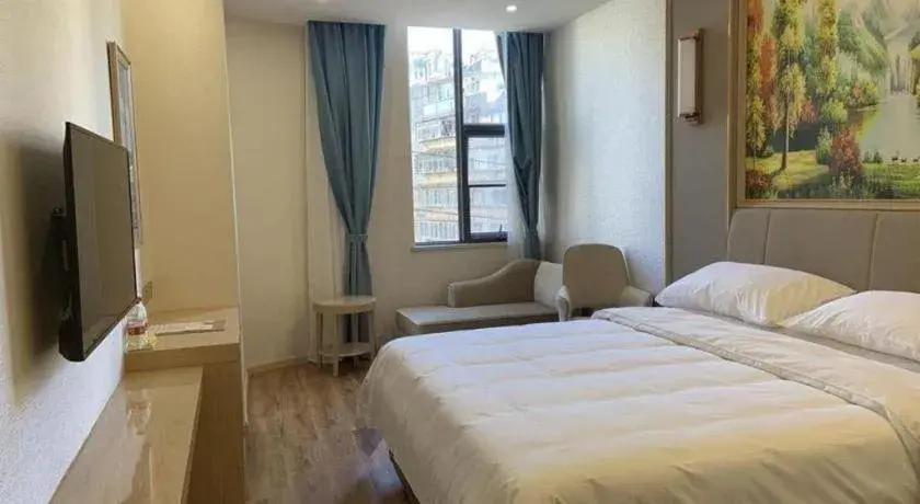 Bed in Vienna Hotel Kunming Baiyun Road Metro Station Jiang'an Bed in Vienna Hotel Kunming Baiyun Road Metro Station Jiang'an