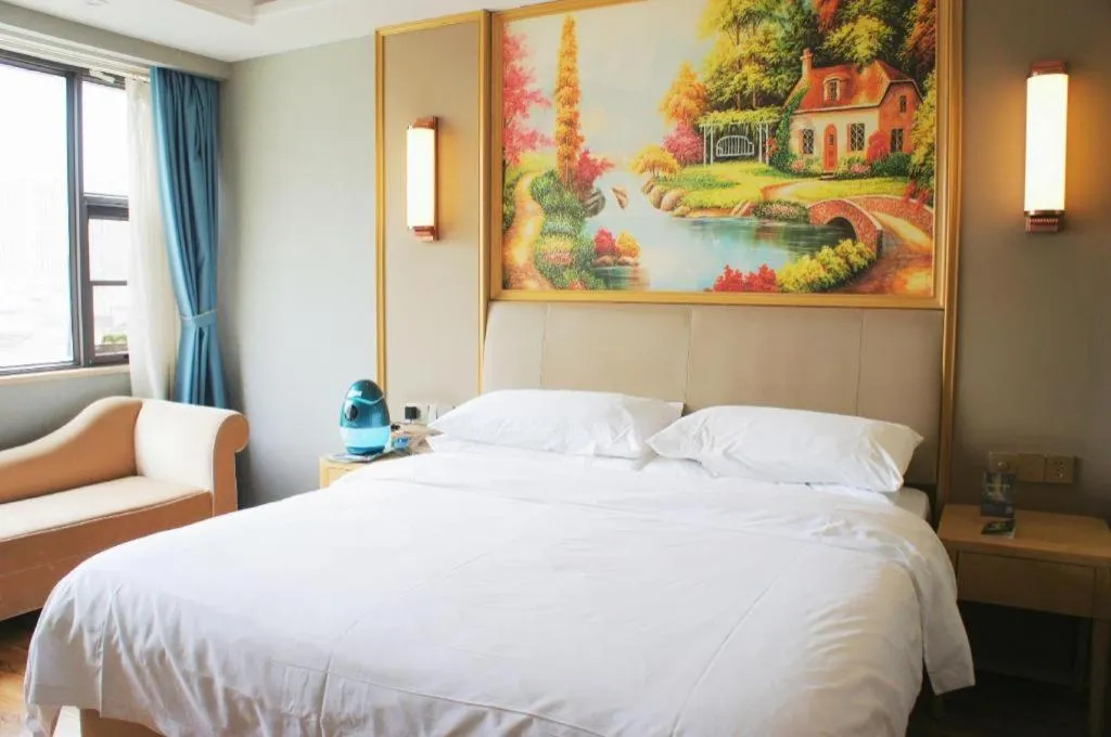 Bed in Vienna Hotel Kunming Baiyun Road Metro Station Jiang'an