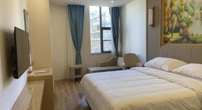 Bed in Vienna Hotel Kunming Baiyun Road Metro Station Jiang'an