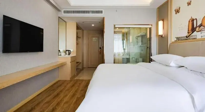 Bed in Vienna Hotel Kunming Baiyun Road Metro Station Jiang'an Bed in Vienna Hotel Kunming Baiyun Road Metro Station Jiang'an