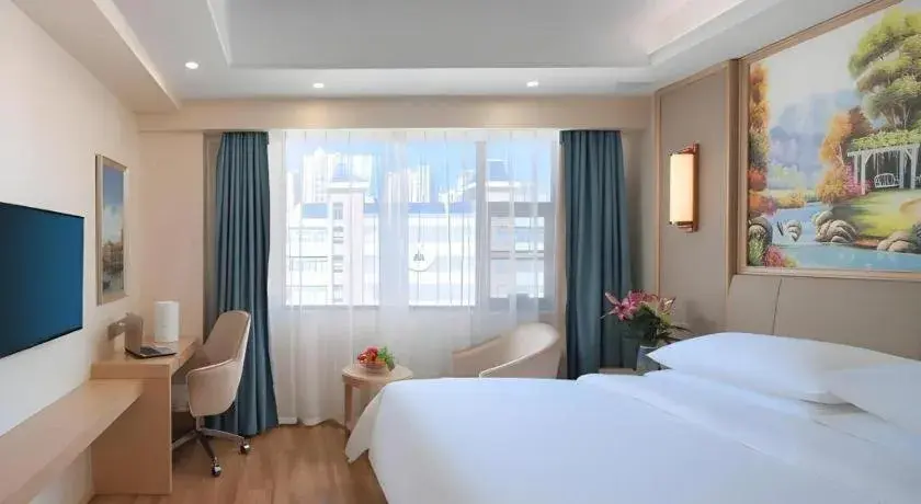 Bed in Vienna Hotel Kunming Baiyun Road Metro Station Jiang'an Bed in Vienna Hotel Kunming Baiyun Road Metro Station Jiang'an