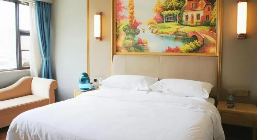 Bed in Vienna Hotel Kunming Baiyun Road Metro Station Jiang'an Bed in Vienna Hotel Kunming Baiyun Road Metro Station Jiang'an