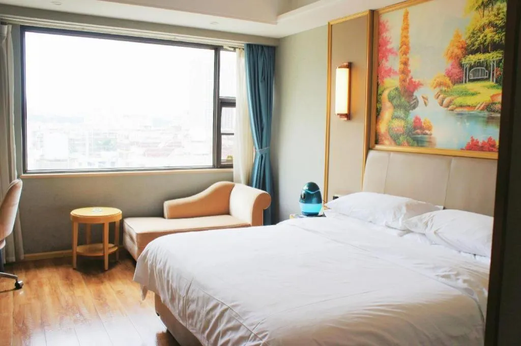 Bed in Vienna Hotel Kunming Baiyun Road Metro Station Jiang'an