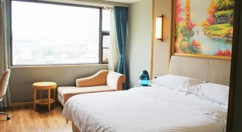 Bed in Vienna Hotel Kunming Baiyun Road Metro Station Jiang'an Bed in Vienna Hotel Kunming Baiyun Road Metro Station Jiang'an